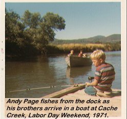 Andy Page fishes from the dock as his brothers arrive in a boat at Cache Creek, Labor Day Weekend, 1971